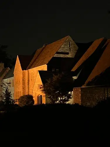 Nightfall unveils ancient beauty in warm light.